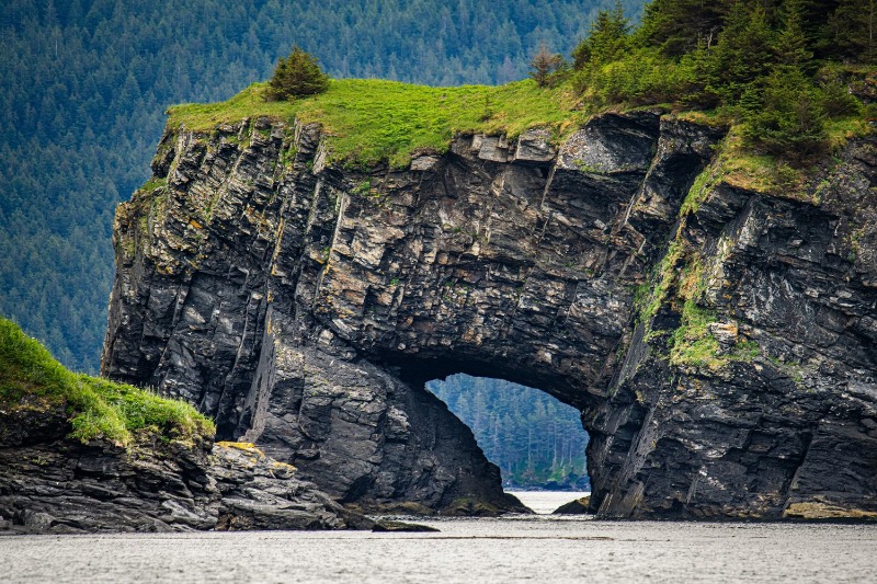 Alaska Vacation: A stunning image of a unique rock formation sticking out from the shores of Afognak Island, Alaska.